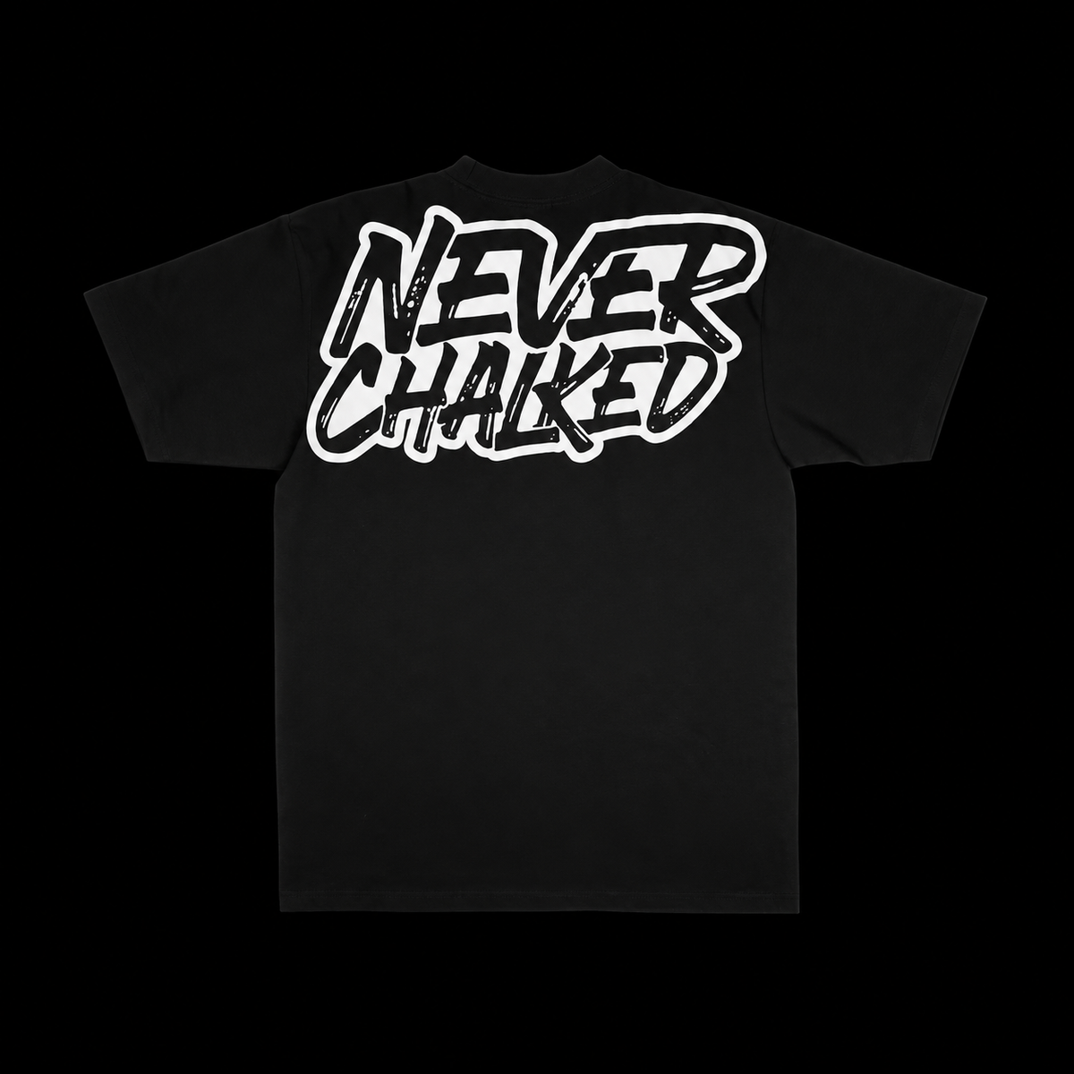 Back of the black Never Chalked Classic Heavyweight Tee with white graphic on a black background